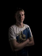 AMS posing with Crowns eSports Club's jersey.